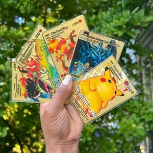 Gold plated metal pokemon cards. Christmas gift